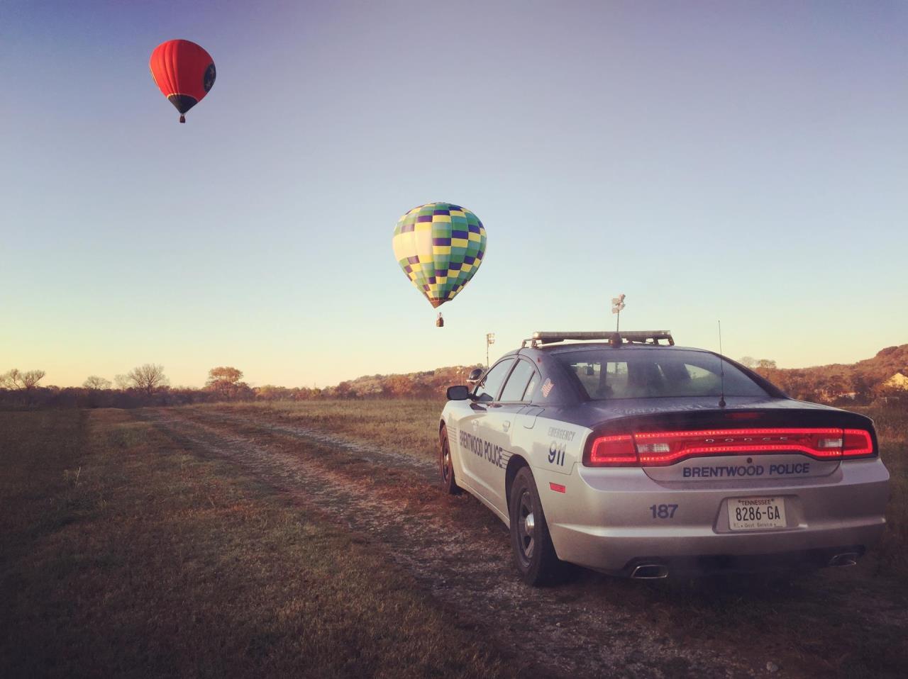 Police car with hot air balloons